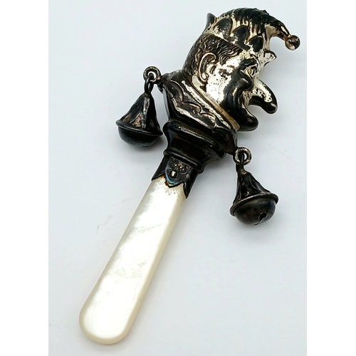 882 - A Vintage Silver Mr Punch Baby Rattle with Mother of Pearl Handle. Hallmarks for Birmingham, 1941. 7... 