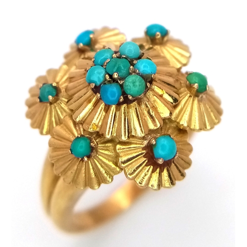 92 - An Italian 18K Yellow Gold and Turquoise Ring. Floral and umbrella form creates a stand-out piece of... 