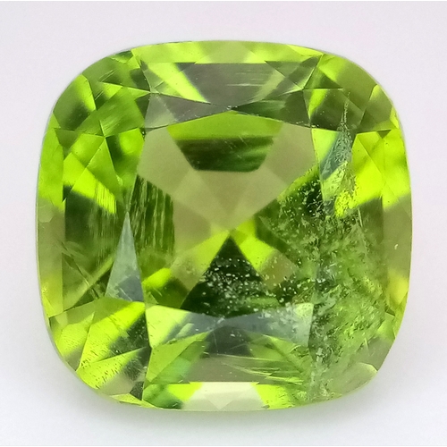 1209 - A 4.81ct Natural Pakistan Peridot Gemstone, Brilliant Cut, 10.00 x 9.92 x 6.82mm. Comes with a GFCO ... 