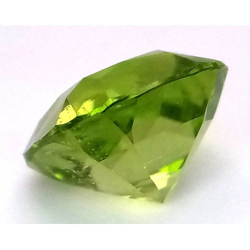 1209 - A 4.81ct Natural Pakistan Peridot Gemstone, Brilliant Cut, 10.00 x 9.92 x 6.82mm. Comes with a GFCO ... 