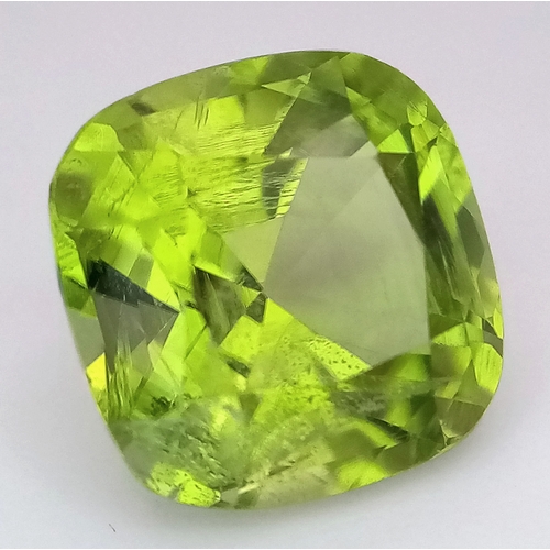 1209 - A 4.81ct Natural Pakistan Peridot Gemstone, Brilliant Cut, 10.00 x 9.92 x 6.82mm. Comes with a GFCO ... 