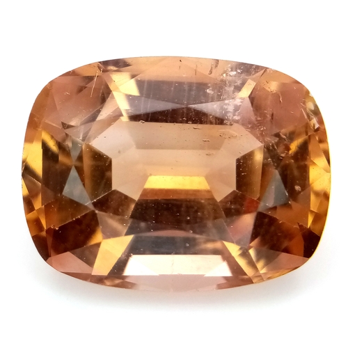 1328 - A 19.32ct Imperial Topaz Gemstone. Cushion shape. GFCO Swiss Certified.