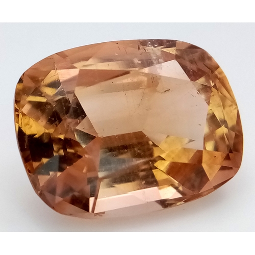 1328 - A 19.32ct Imperial Topaz Gemstone. Cushion shape. GFCO Swiss Certified.