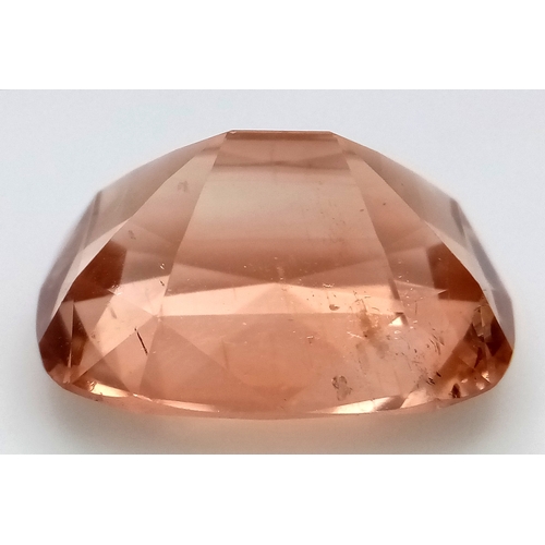 1328 - A 19.32ct Imperial Topaz Gemstone. Cushion shape. GFCO Swiss Certified.