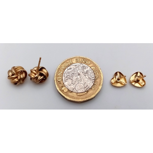 1561 - Two Different Style Pairs of 9K Gold Stud Earrings - Heart and Knot form. 1.1g