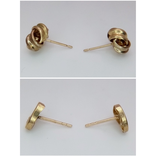 1561 - Two Different Style Pairs of 9K Gold Stud Earrings - Heart and Knot form. 1.1g