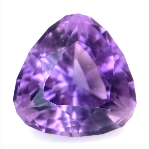 850 - A 7ct Bolivian Amethyst Gemstone. Trillion shape. Comes with a GFCO Swiss authenticity card.