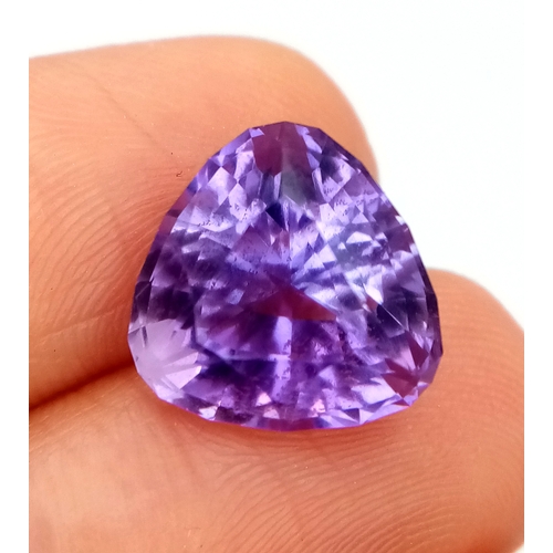 850 - A 7ct Bolivian Amethyst Gemstone. Trillion shape. Comes with a GFCO Swiss authenticity card.