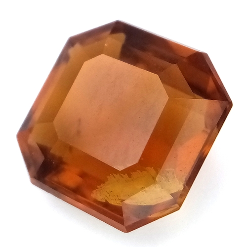 878 - A 4.91ct Madeira Citrine Gemstone. Octagon shape. Comes with GFCO Swiss authenticity card.