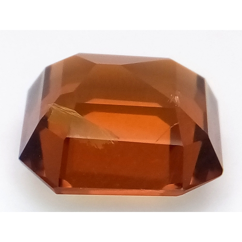 878 - A 4.91ct Madeira Citrine Gemstone. Octagon shape. Comes with GFCO Swiss authenticity card.