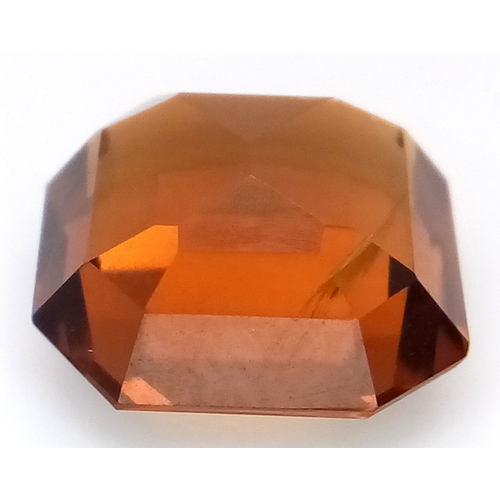 878 - A 4.91ct Madeira Citrine Gemstone. Octagon shape. Comes with GFCO Swiss authenticity card.