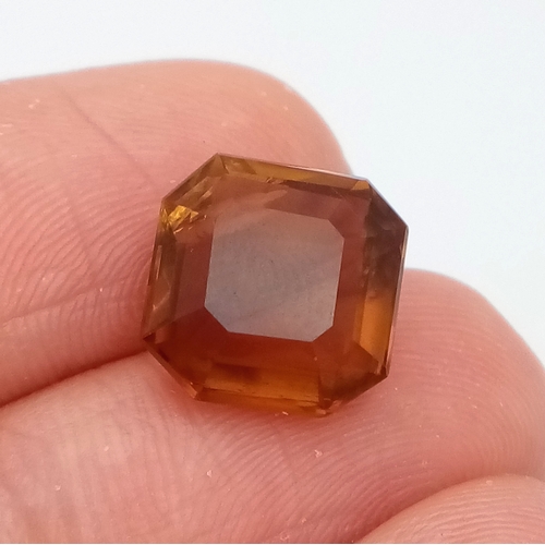 878 - A 4.91ct Madeira Citrine Gemstone. Octagon shape. Comes with GFCO Swiss authenticity card.