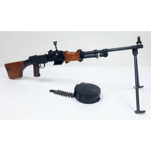 96 - A Soviet RPD Machine Gun with Tripod. This 20 inch barrel, 7.62 calibre weapon was produced between ... 