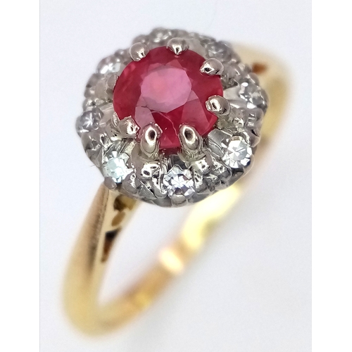 109 - AN 18K YELLOW GOLD DIAMOND & RUBY CLUSTER RING 3.1G TOTAL WEIGHT, SIZE L. Ref: A/S 1209