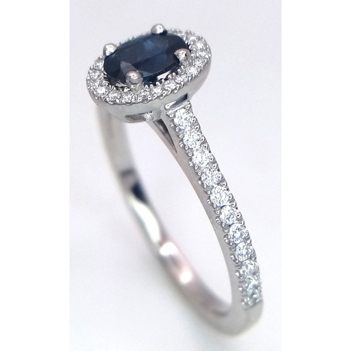 123 - A PLATINUM DIAMOND & SAPPHIRE HALO RING 4.5G TOTAL WEIGHT, SIZE M. Ref: 9118