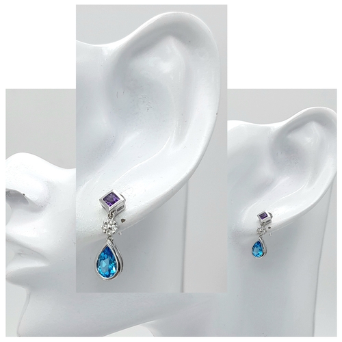 151 - A PAIR OF 18K WHITE GOLD DIAMOND, AMETHYST & TOPAZ SET DROP EARRINGS 2.6G, 2CM DROP. Ref: 8004