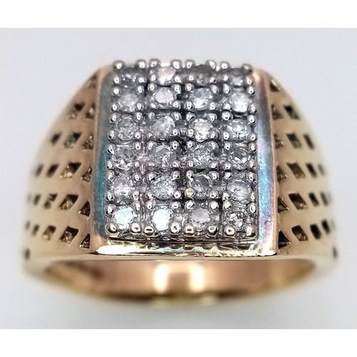 66 - A 9K YELLOW GOLD DIAMOND SET SIGNET RING. 0.35CT DIA, 7.8G TOTAL WEIGHT, SIZE O. Ref: SC 3005