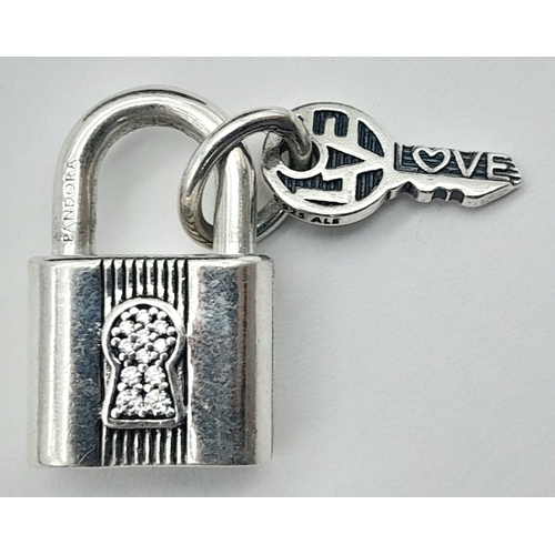 887 - A PANDORA STERLING SILVER PADLOCK AND KEY CHARM 8.3G TOTAL WEIGHT, 2CM x 1.2CM. Ref: H 3002