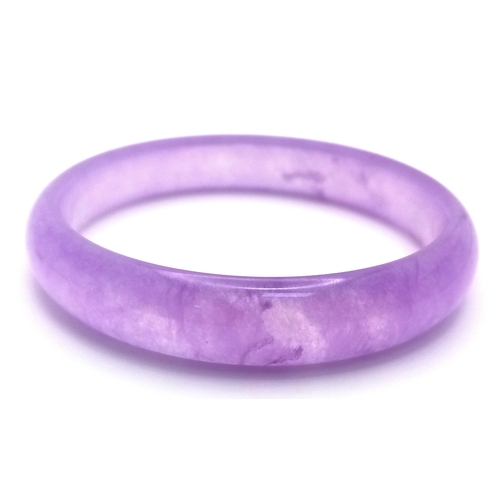 889 - A Lavender Jadeite Bangle. 8mm width. 58mm inner diameter.