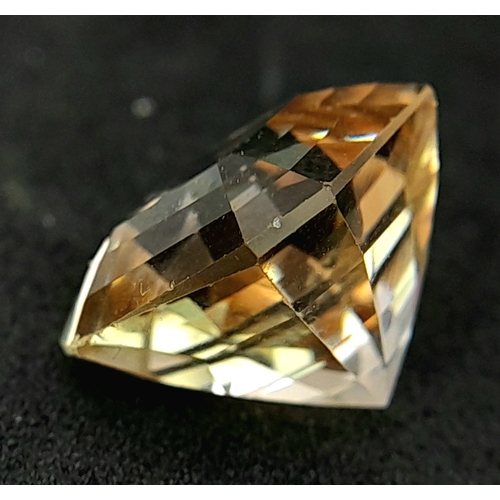 899 - A 14.20ct Imperial Topaz Gemstone. GFCO Swiss Certified.