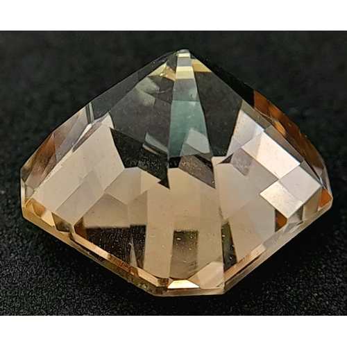 899 - A 14.20ct Imperial Topaz Gemstone. GFCO Swiss Certified.