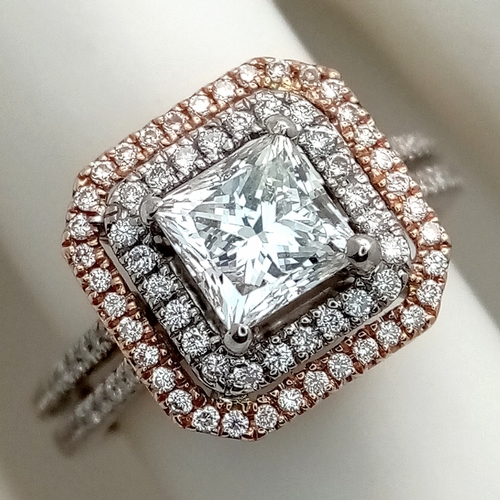 501 - A GIA Certified 18K White Gold and Diamond Ring. A modified square brilliant cut 0.97ct diamond of S... 