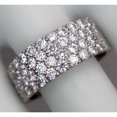 515 - A WGI Certified 14K White Gold (tested) Diamond Eternity Ring. Four rows set with 112 brilliant roun... 