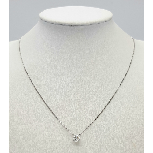 529 - A WGI Certified 18K White Gold and Diamond Pendant on an 18K White Gold Chain. 0.78 brilliant round ... 