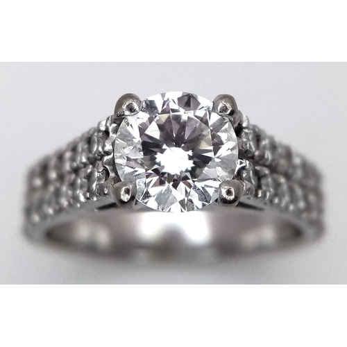 600 - A GIA Certified 18K White Gold Diamond Ring. A 0.75ct brilliant round cut centre stone with VS1 clar... 