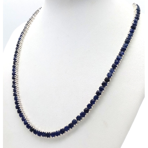 527 - A Blue Sapphire Gemstone Tennis Necklace. Set in 925 Silver.
44cm. CD-1670.