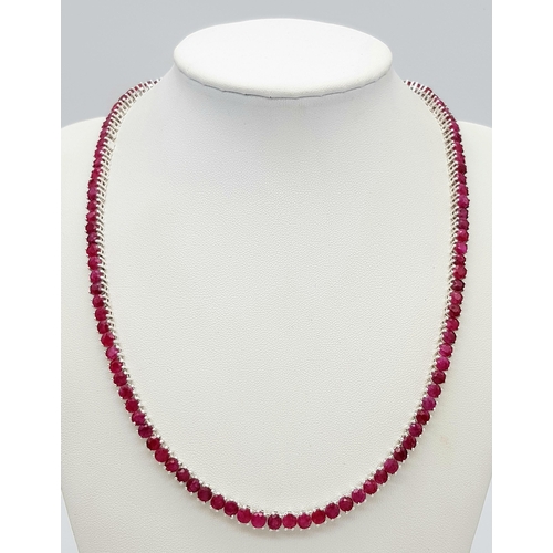 540 - A Ruby Gemstone Tennis Necklace set in 925 Silver. 44cm. CD-1671