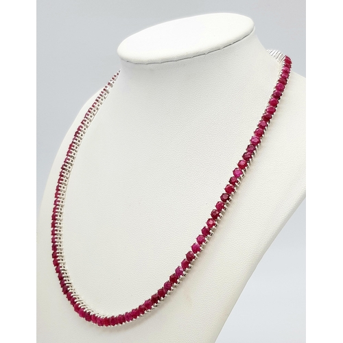 540 - A Ruby Gemstone Tennis Necklace set in 925 Silver. 44cm. CD-1671