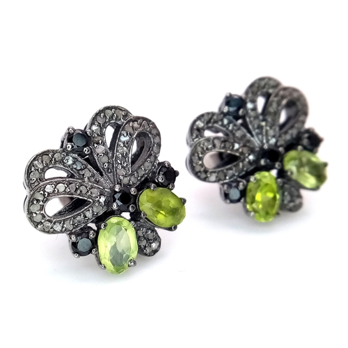 561 - A Pair of Peridot and Sapphire Stud Earrings with Diamond Accents. Set in 925 Silver. CD-1676.