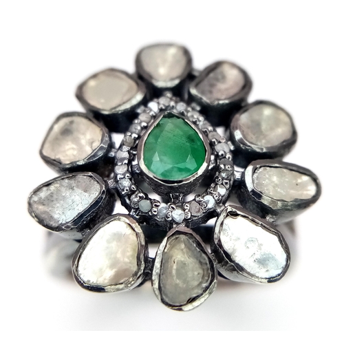 596 - An Emerald and Polki Diamond Ring set in 925 Silver. Size P. 8.7g total weight. 1.2ctw diamonds. CD-... 