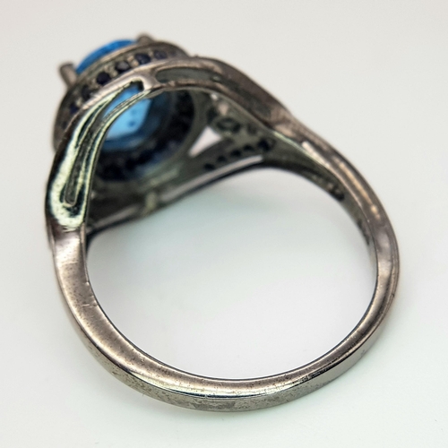 624 - A 2.5ct Blue Topaz Gemstone Ring with Diamond Accents. Set in 925 silver. Size O 1/2. CD-1684