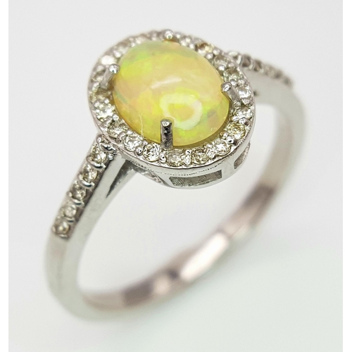 715 - A 1.5ct Fire Opal Ring with 0.30ct of Diamond Accents. Set in 925 Silver. Size N. CD-1682.