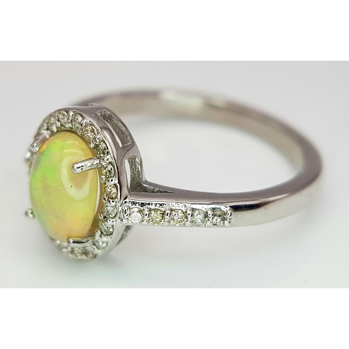 715 - A 1.5ct Fire Opal Ring with 0.30ct of Diamond Accents. Set in 925 Silver. Size N. CD-1682.