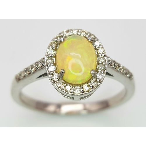 715 - A 1.5ct Fire Opal Ring with 0.30ct of Diamond Accents. Set in 925 Silver. Size N. CD-1682.