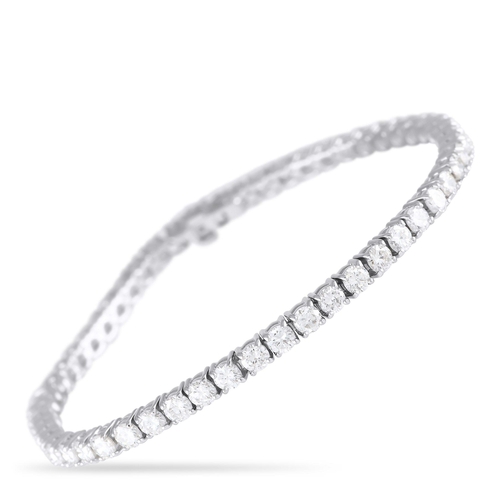 705 - An 18K White Gold 6.86ct Diamond Tennis Bracelet. Diamonds with a total weight of 6.86 carats and 18... 