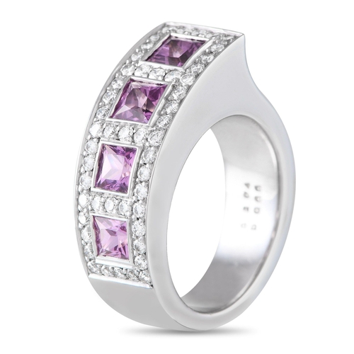 712 - A Bucherer 18K White Gold 0.65ct Diamond and Sapphire Ring. A series of four pink sapphire gemstones... 