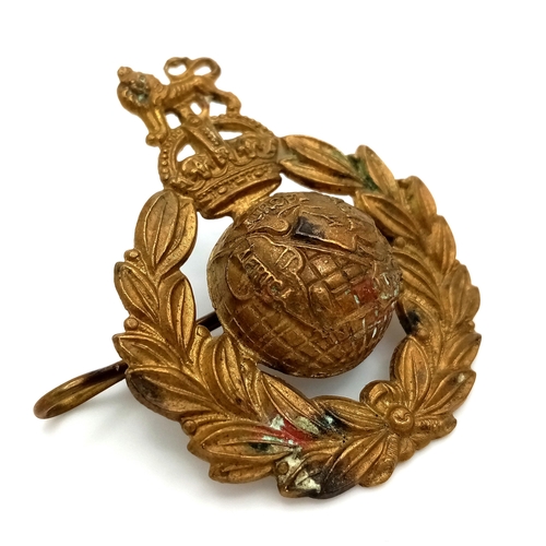 276 - A WW2 Royal Marine Commando Cap Badge with hidden compass.