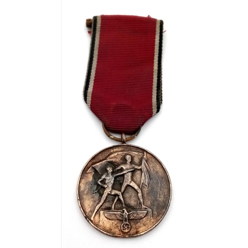 436 - A 3rd Reich Anschluss Commemorative Medal. Given to German & Austrian State officials and members of... 