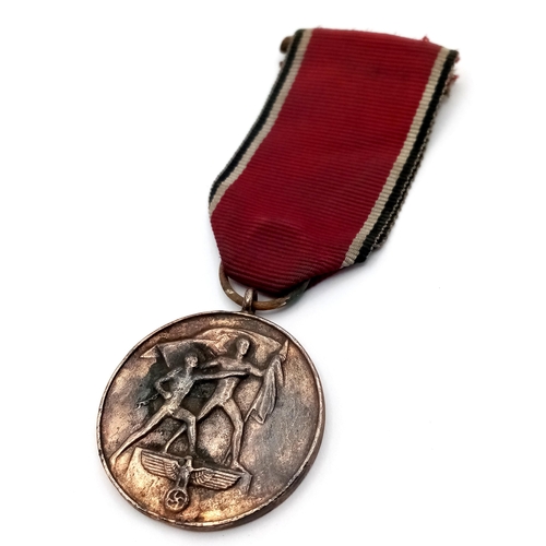 436 - A 3rd Reich Anschluss Commemorative Medal. Given to German & Austrian State officials and members of... 