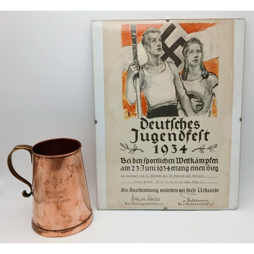 807 - A 1934 Hitler Youth Sports Tankard and certificate.