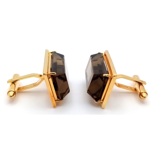 30 - A Pair of 14k Gold and Large Rectangular Cut Smoky Quartz Cufflinks. 21.4g total weight. With case.