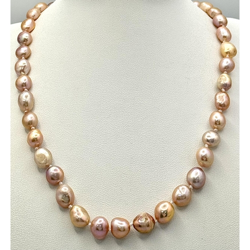 736 - A Lavender Small Baroque Freshwater Pearl Necklace. 42cm.