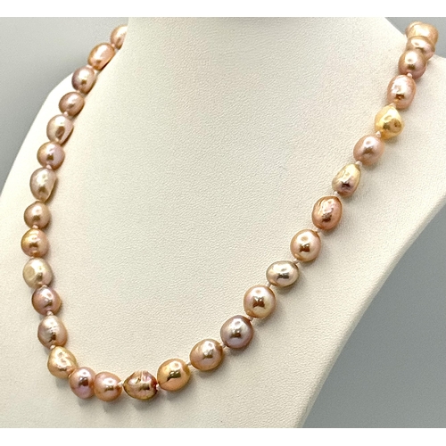 736 - A Lavender Small Baroque Freshwater Pearl Necklace. 42cm.