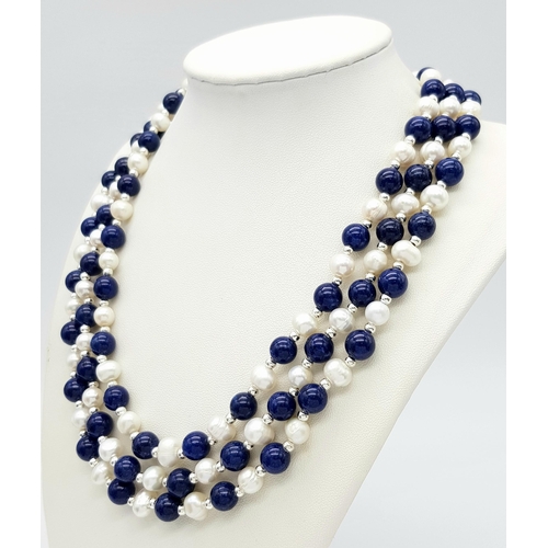 890 - A Three Row Lapis Lazuli and Cultured Pearl Necklace. 40-42cm. 7/8 mm.