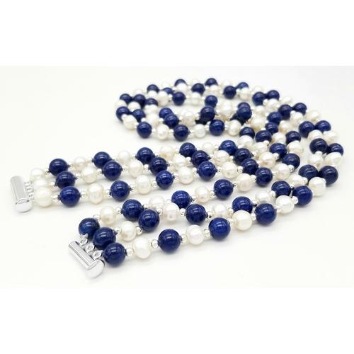 890 - A Three Row Lapis Lazuli and Cultured Pearl Necklace. 40-42cm. 7/8 mm.