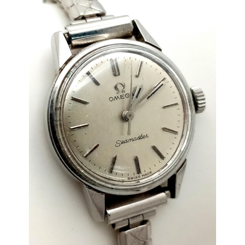 407 - A Vintage Omega Seamaster Ladies Watch. Expandable bracelet. Stainless steel case - 24mm. Silver ton... 